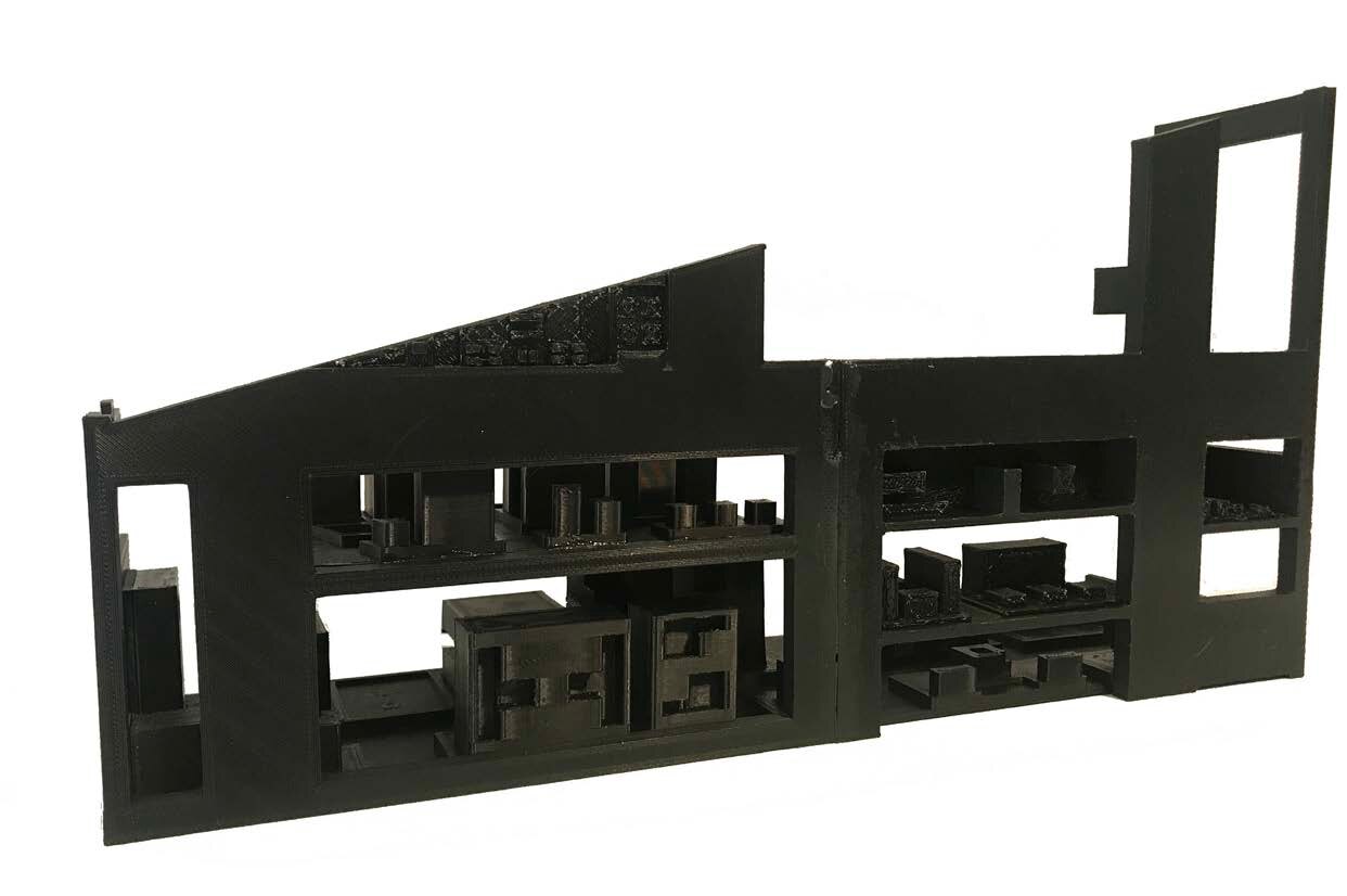 Dark model of a city block studying positive and negative space