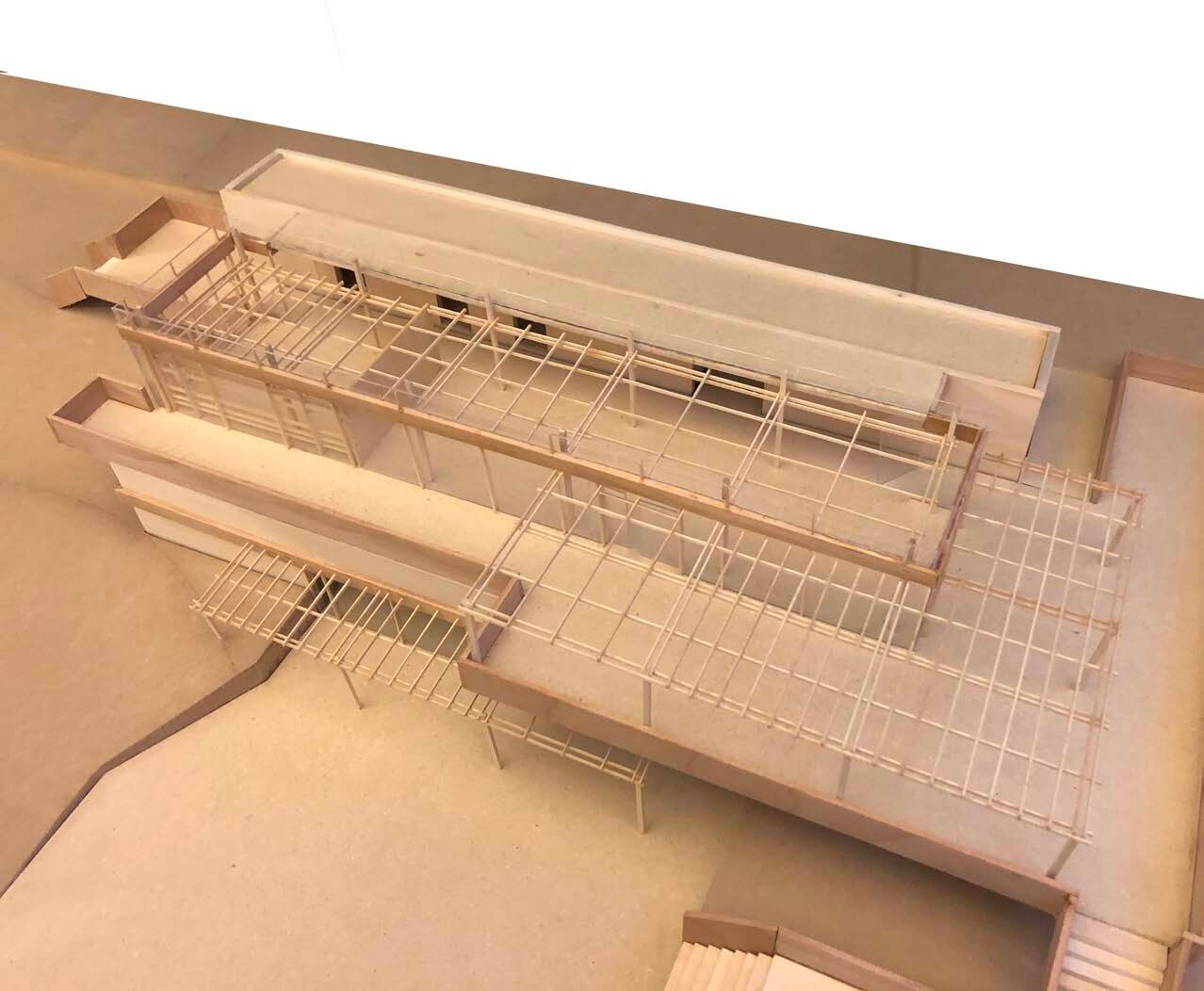 Aerial view of a layered wooden facade study model
