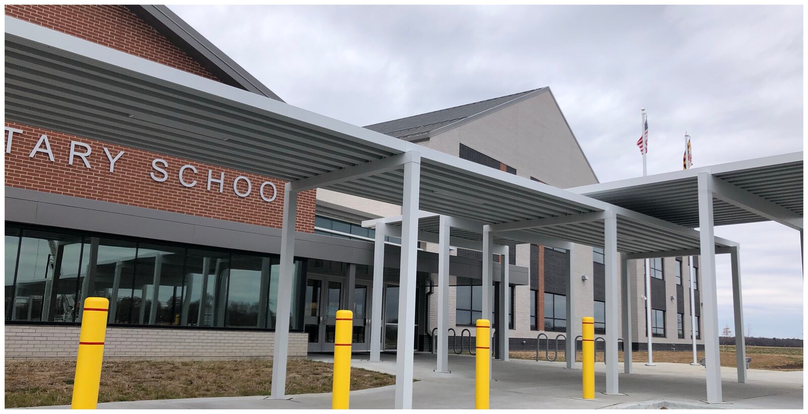 Covered walkway at the existing school entrance